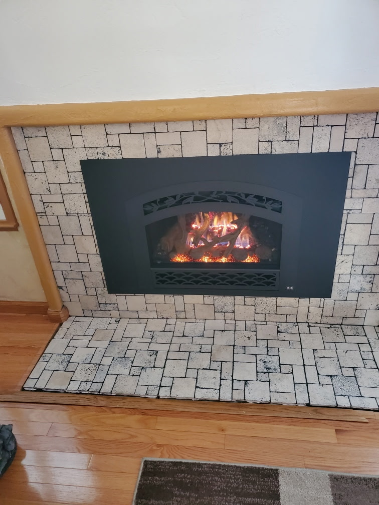 Travertine mosaic fireplace surround